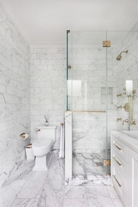 Marble Tile Continues From Floor Into Shower Base