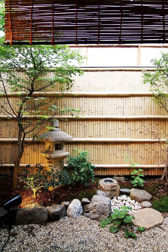 Stone Lantern Anchors a Small Garden Bed