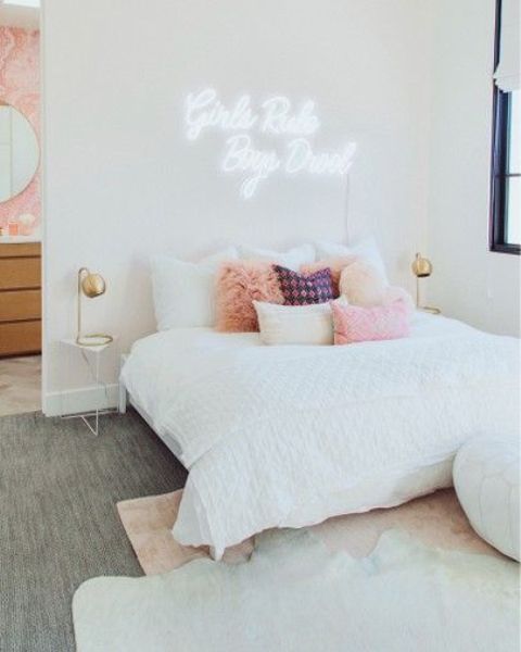 Neon Sign That Adds a Playful Statement Above the Bed