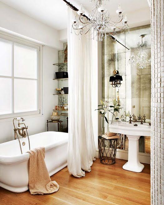 Antique Mirror Wall Reflects Light for a Glamorous Effect
