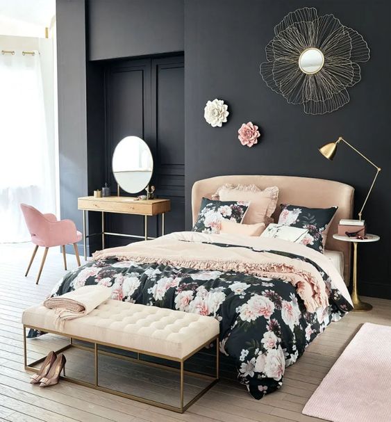 Wire Flower Mirror Adds Metallic Texture Above Bed
