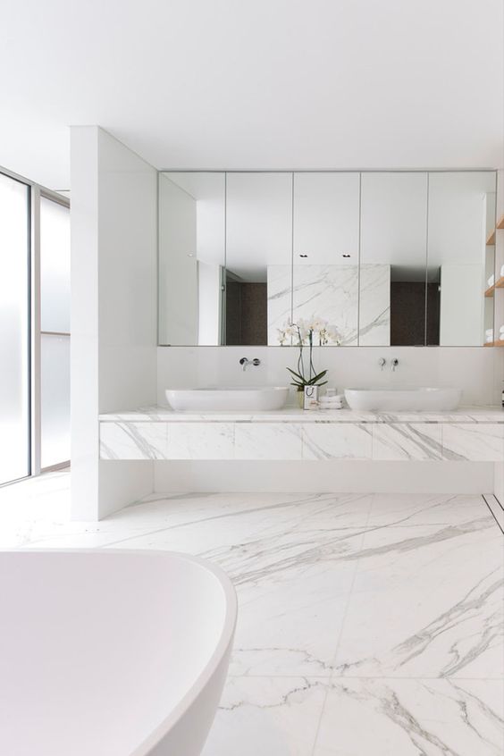 White Orchid Adds a Delicate Touch to Marble Vanity