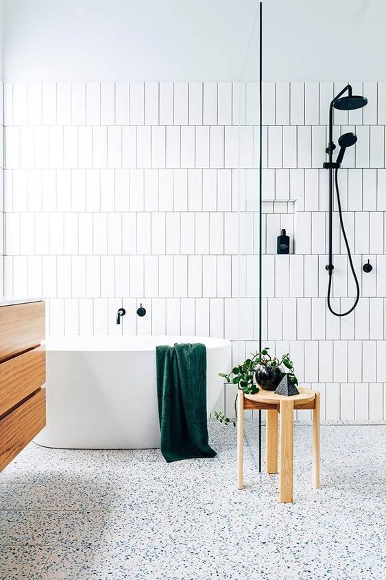 Wooden Stool Adds a Natural Accent Beside the Tub