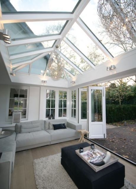 Ornate Chandelier Adds Sparkle Under the Glass Roof