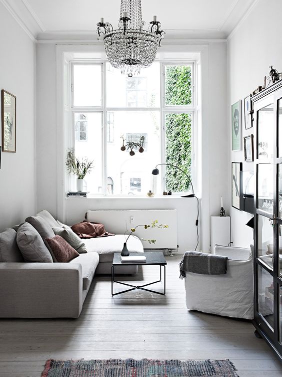 Crystal Chandelier Adds Dramatic Sparkle Above Seating