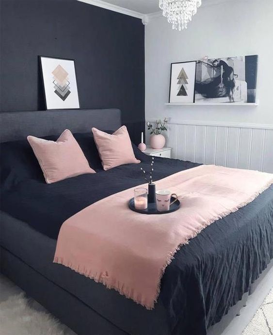 Pink Throw Adds Soft Texture Over Dark Bedding