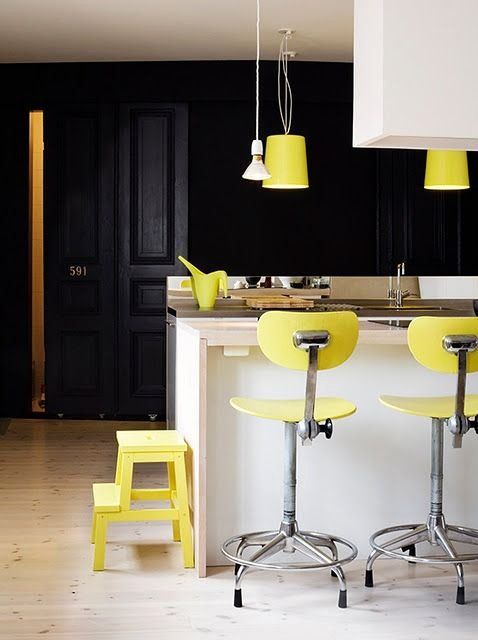 Two-Tiered Yellow Step Stool for Easy Access to High Shelves