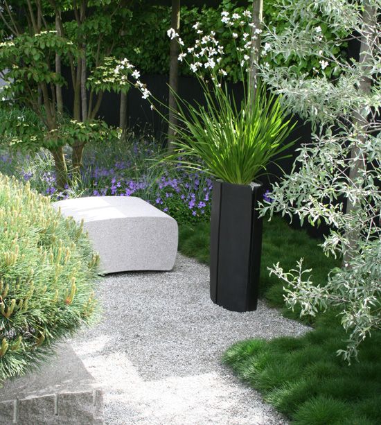Define a Gravel Path with a Tall Black Planter