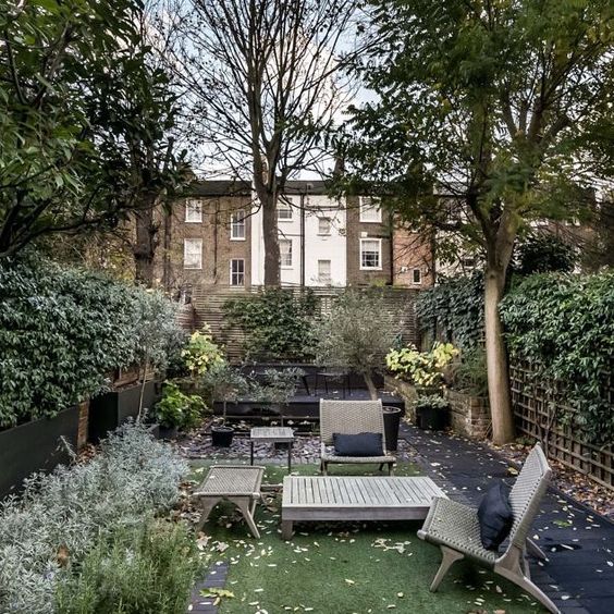 Anchor a Compact Courtyard with a Low-Profile Wooden Lounge Set