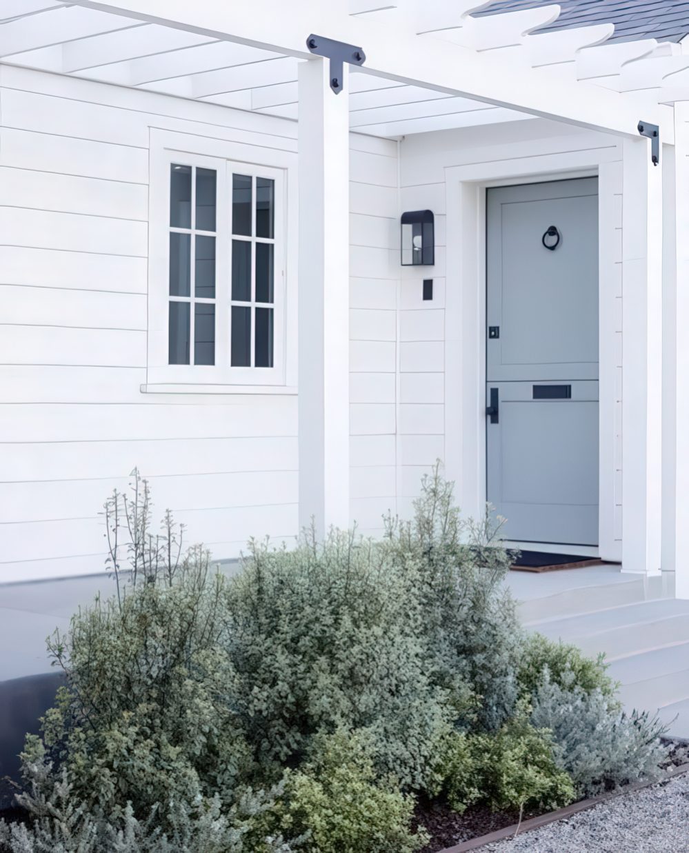Layered Greenery Softens Modern Home Entrance