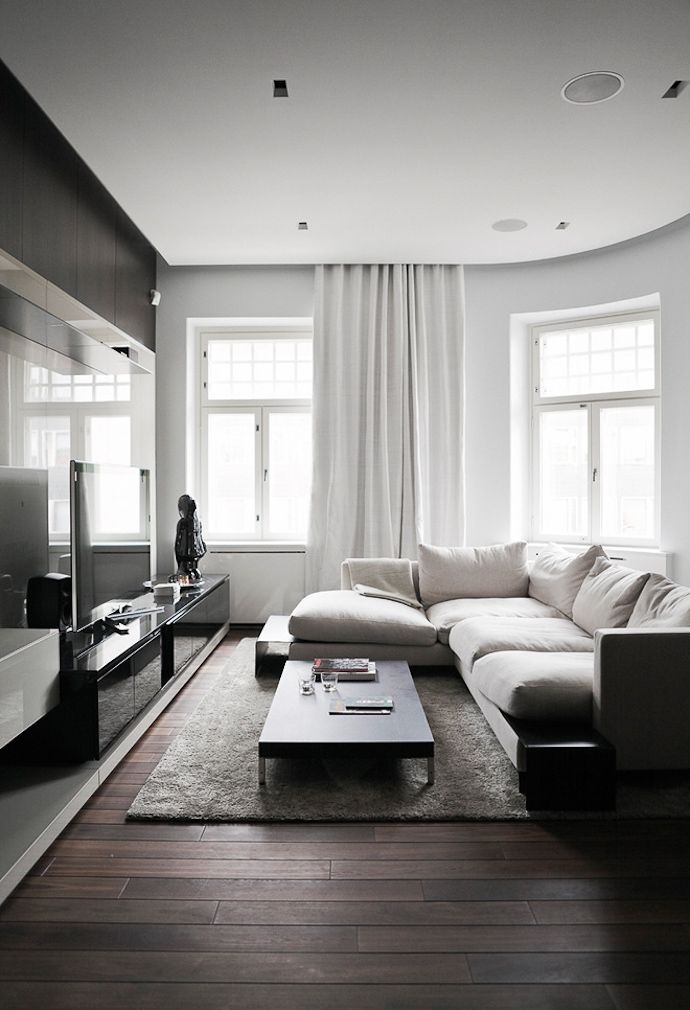 Introduce Layered Height with Stacked Books on a Low Coffee Table