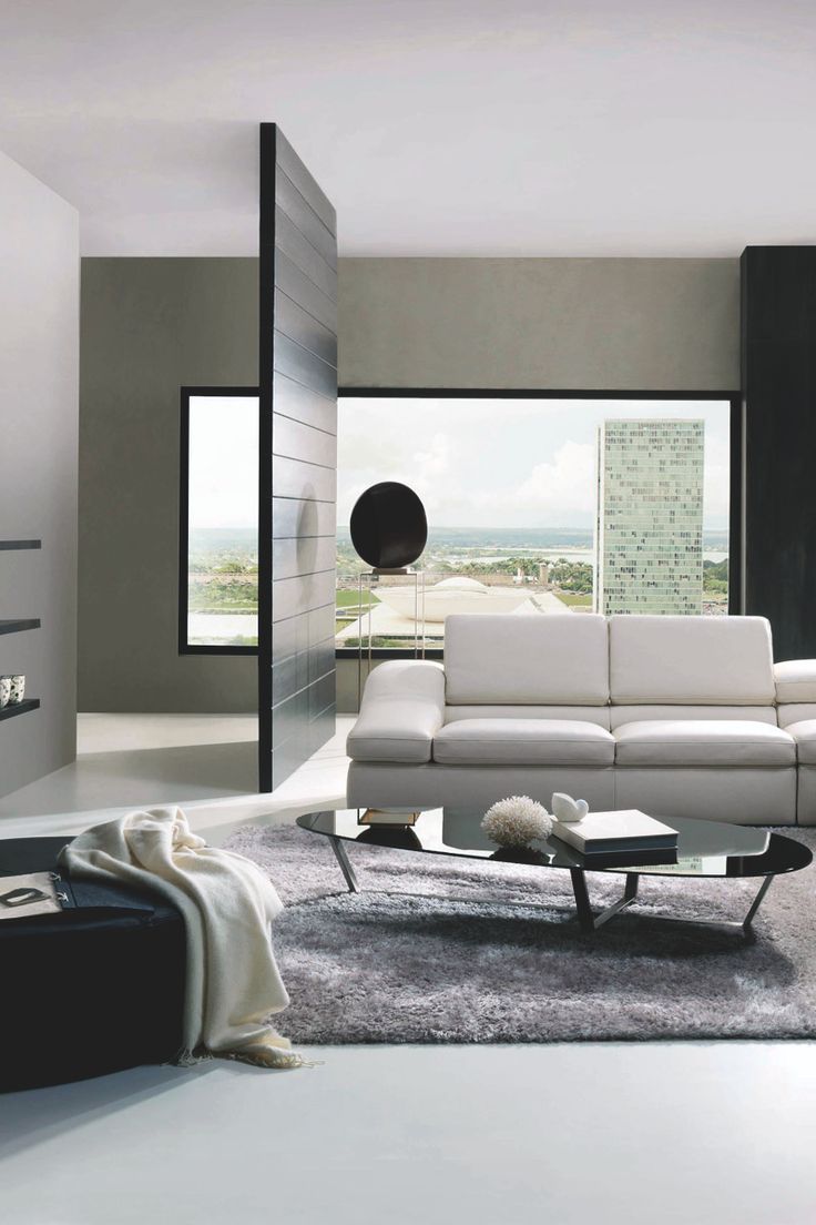 Sliding Wood Panel Room Divider Creates Dynamic Openings