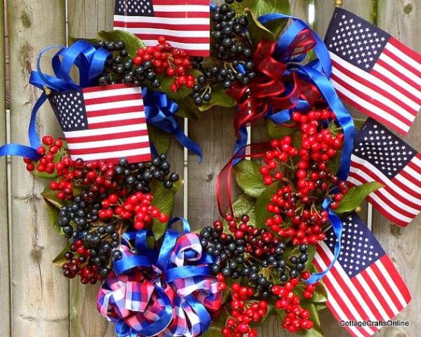 Miniature Flags and Berry Sprigs Adorn a Patriotic Wreath