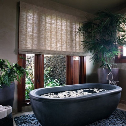 Dark Stone Tub Creates a Relaxing Spa Ambiance