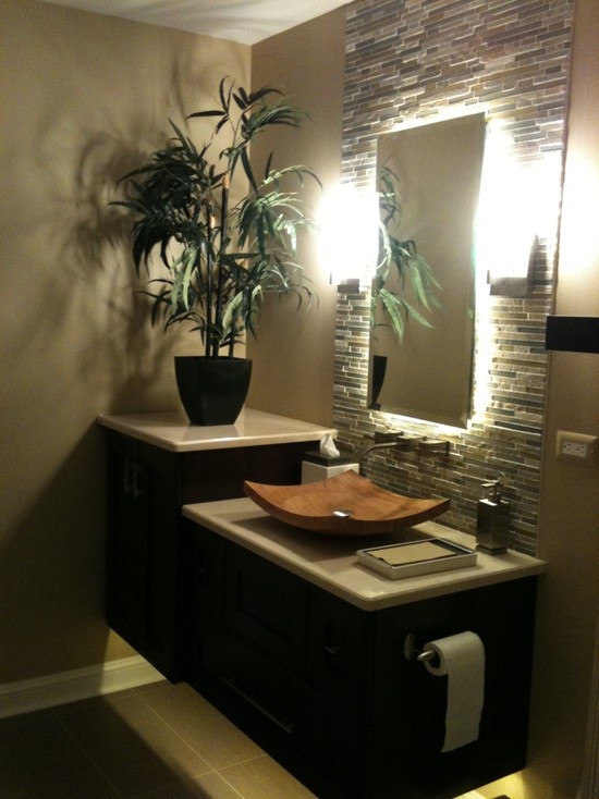 Tall Black Planter Adds Dramatic Greenery to Corner