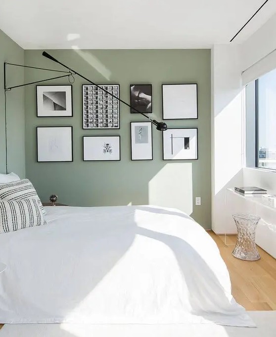 Highlight Your Gallery Wall with an Adjustable Black Swing-Arm Lamp