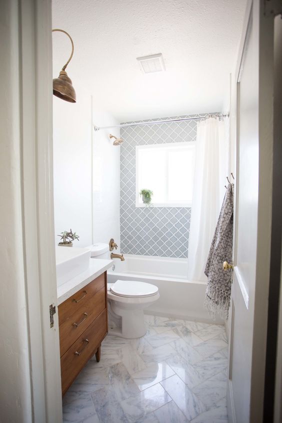 Patterned Tile Accents Around the Window