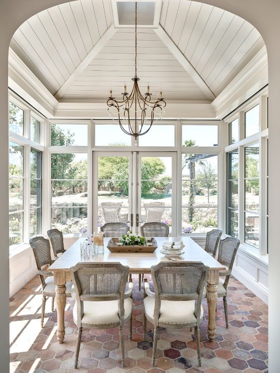 Hexagonal Terracotta Tiles Add Rustic Charm to Sunroom Floors