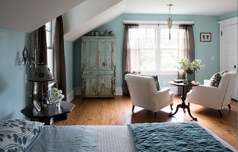 Distressed Cabinet Adds Vintage Charm to a Serene Bedroom