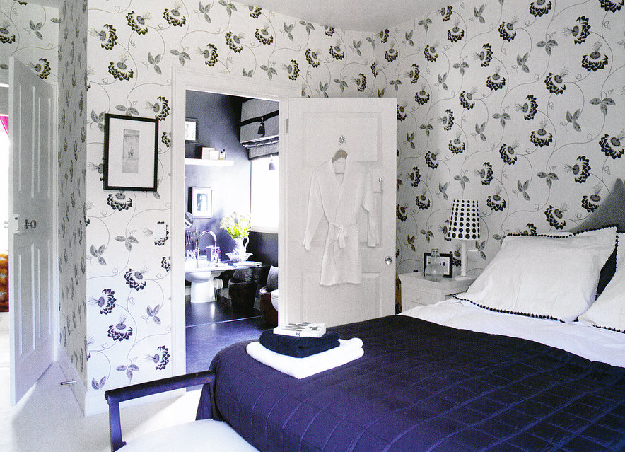 White Robe Hanging on Door Adds Spa-Like Comfort
