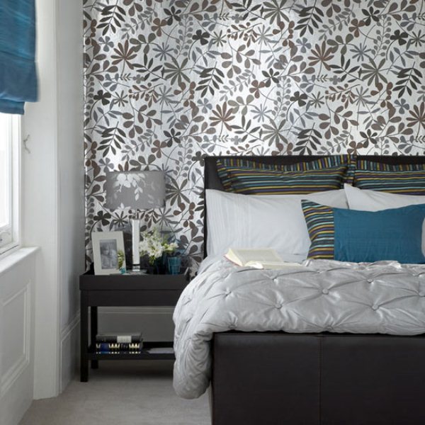 Patterned Wallpaper Adds Depth Behind the Bed