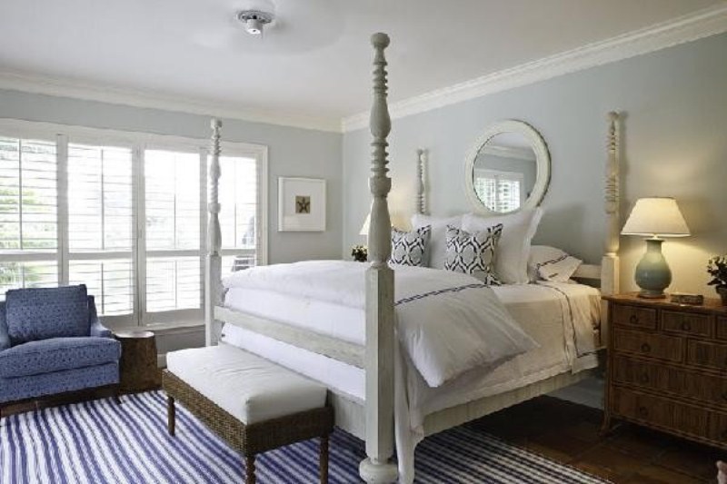 Woven Bench Adds Natural Texture at Foot of Bed