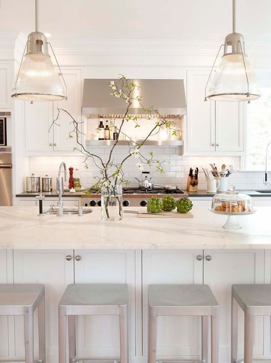 Glass Vase With Branches Adds Organic Texture to Island