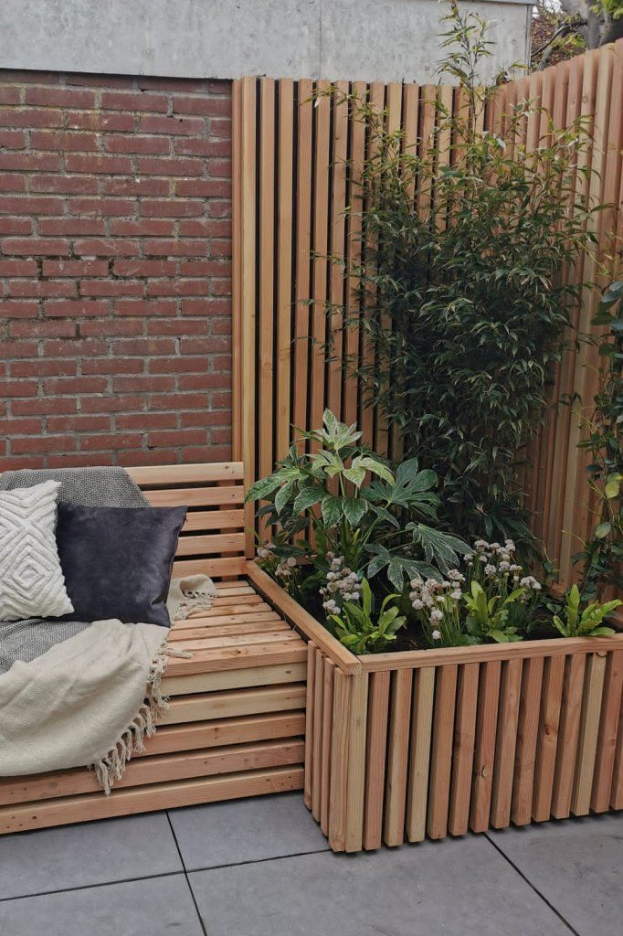 Wooden Planter Bench Creates a Cozy Garden Nook