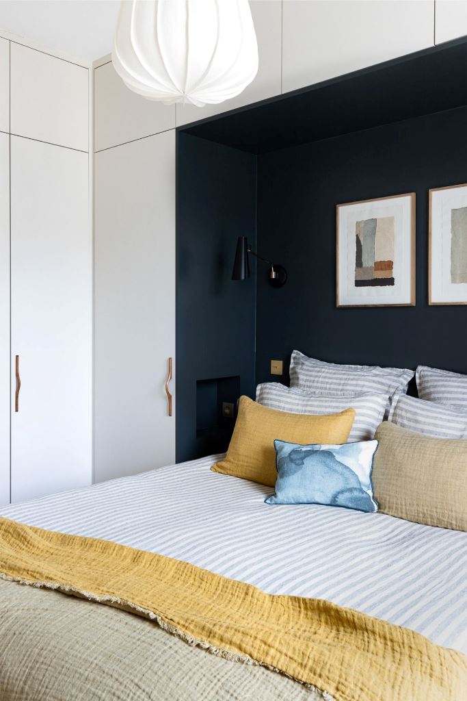 Dark Recessed Niche for Artwork and Wall Sconces