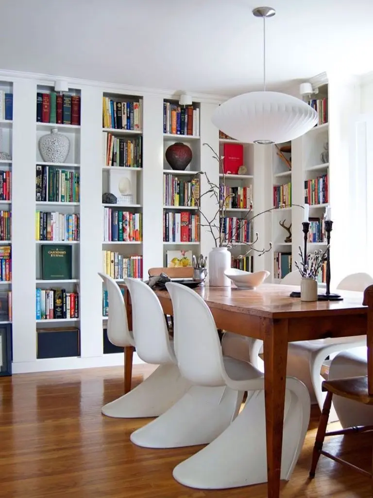 White Tulip Chairs Complement a Wood Dining Table