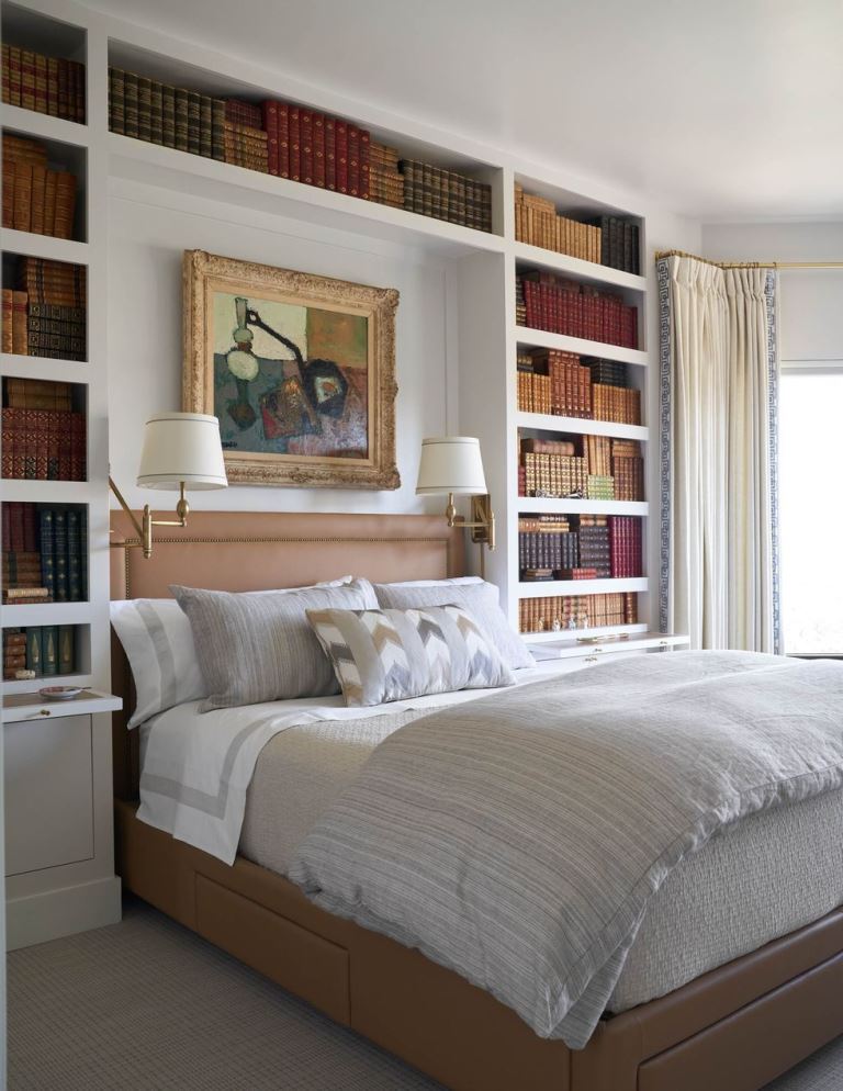 Built-in Shelves That Frame Your Bed With Books and Art