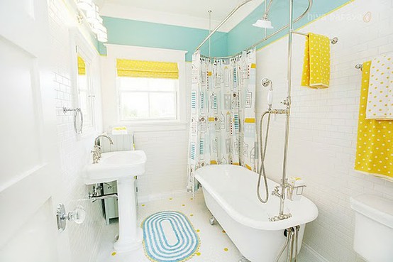 Yellow Polka Dot Towels Add Playful Pattern to White Walls