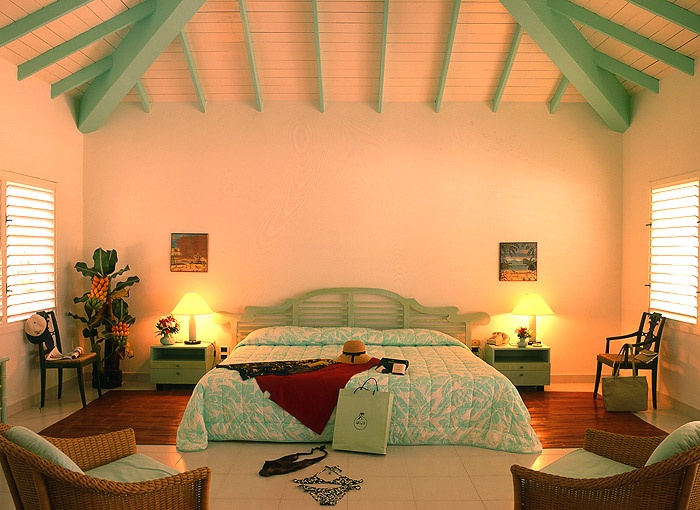 Mint Green Headboard Adds a Coastal Touch to the Bed