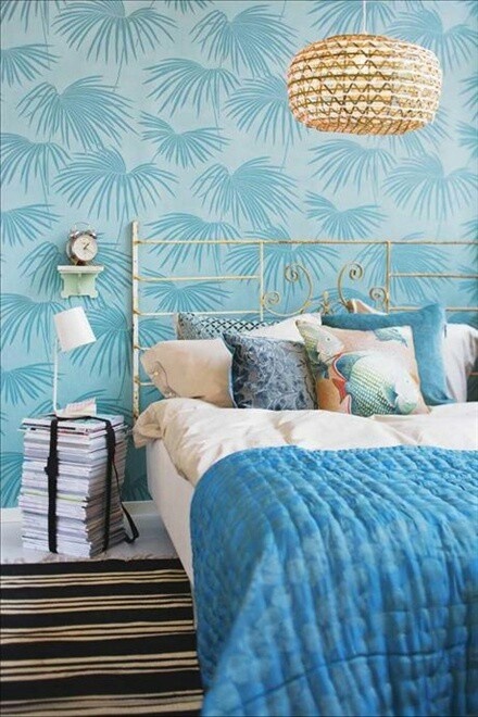 Stack of Magazines Creates a Unique Nightstand Beside Your Bed