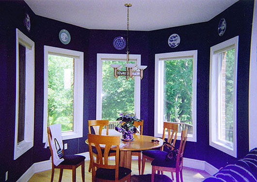 Decorative Plates Add Patterned Accents to Dark Walls
