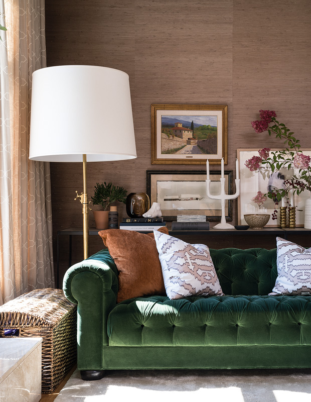 Layer Artwork and Candlesticks on a Console Table