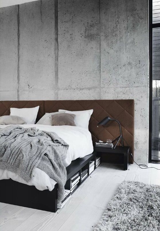 Brown Diamond-Patterned Headboard Softens Concrete Walls