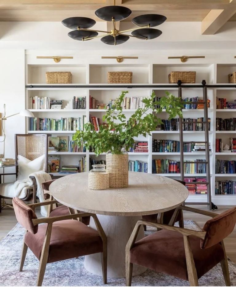 Woven Cane Vases Add Natural Texture To A Round Dining Table
