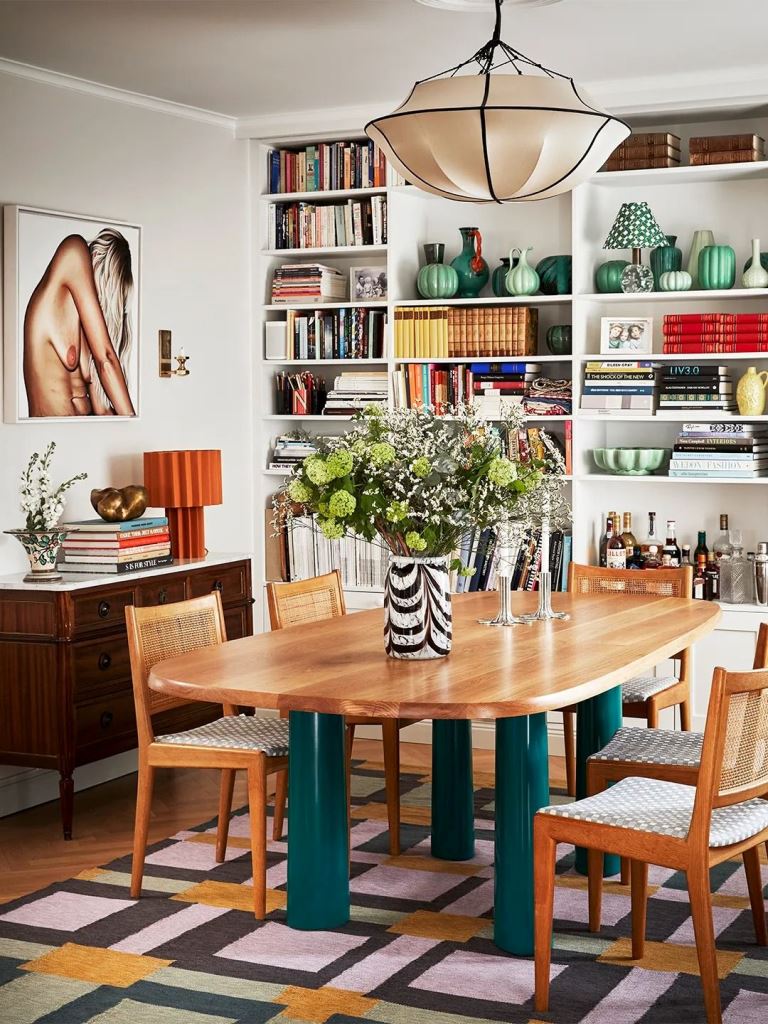 Pillar Legs Add Bold Color To A Wooden Dining Table