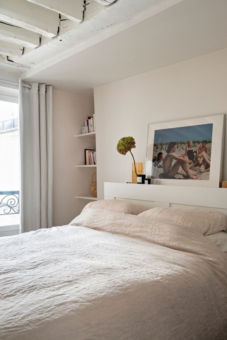 Floating Shelves Above Headboard for Books and Decor