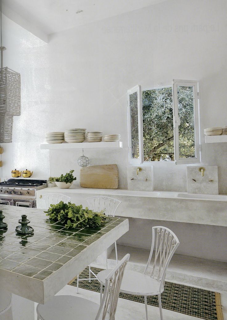 Tiled Kitchen Island With Fresh Greenery Adds Natural Color