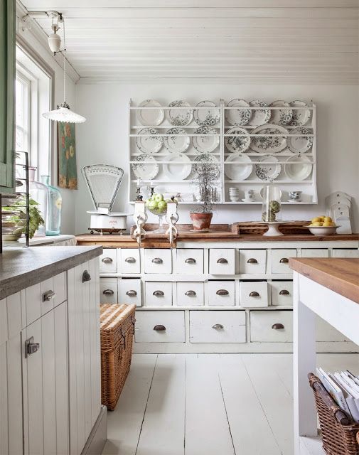 Decorate Walls with a Plate Rack of Blue Patterned Dishes