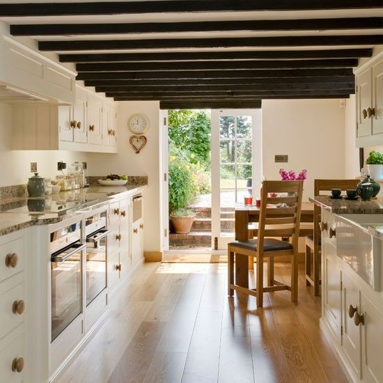 Contrast Dark Beams with Cream Ceilings