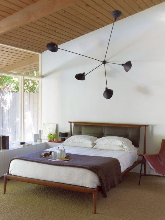 Adjustable Black Chandelier Creates Dynamic Lighting