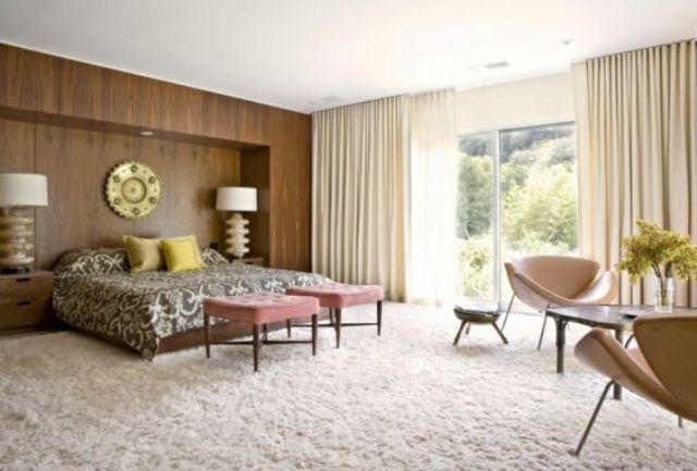 Pink Velvet Ottomans Add a Soft Touch to a Plush Bedroom
