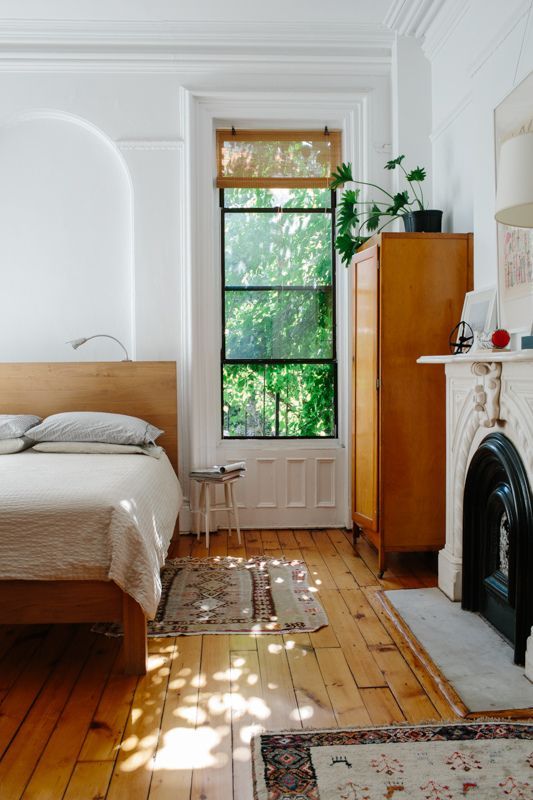 Wooden Armoire Stores Items and Adds Warmth Near Fireplace