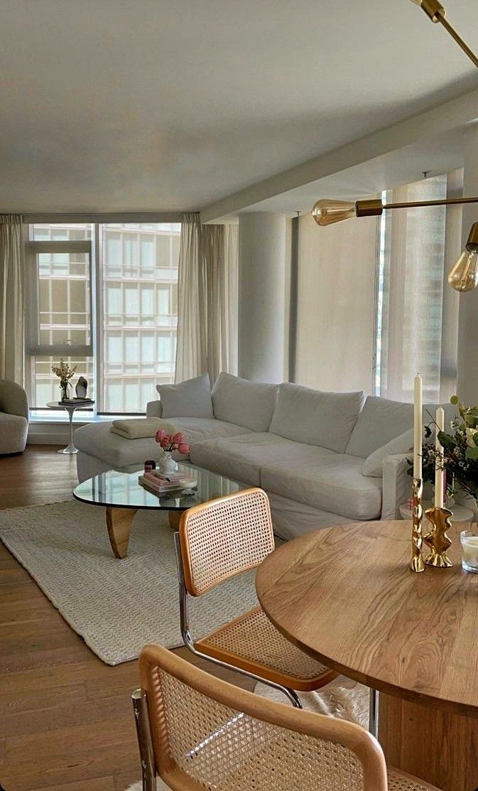 Cane and Chrome Chairs Add Natural Texture to Dining Space