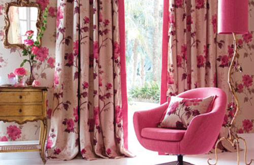 Pink Armchair and Pillow Complement Floral Drapes