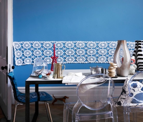 White Lace Runner Adds Delicate Pattern Above Dining Table