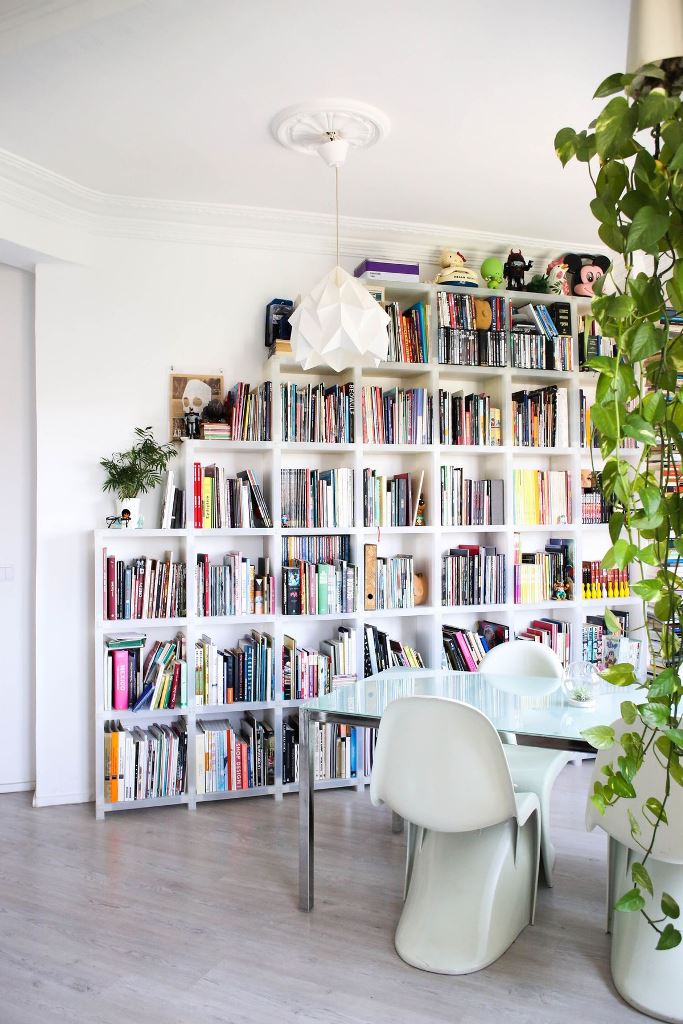 White Shelving Unit Creates a Functional Book Display